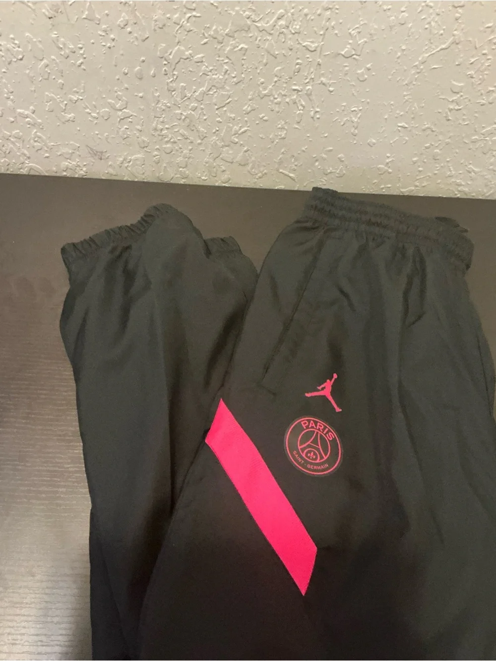 Jordan Men’s Black Track Pants with Pink Accents